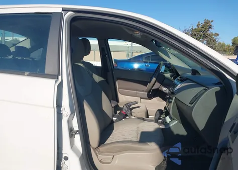 2009 Ford Focus Se из США, поврежденный, VIN 1FAHP35N09W245918